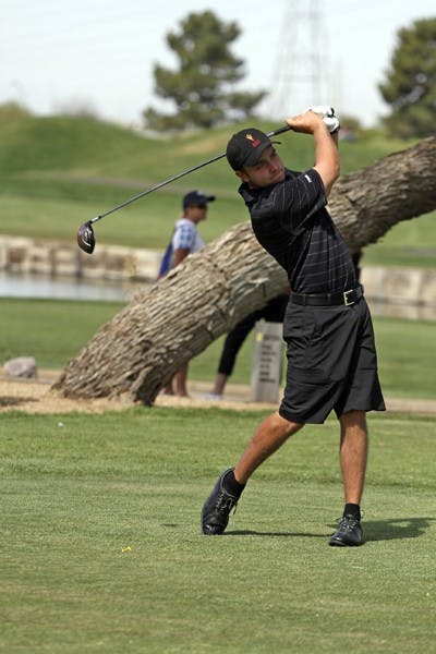 Austin Quick tees off during the ASU Thunderbird Invitational on April 6. Quick finished in second place and led the Sun Devils to a sixth place finish. (Photo by Sam Rosenbaum)