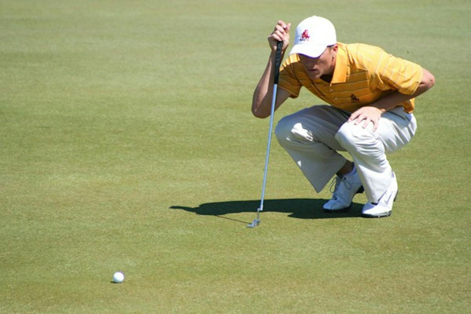 Change of Season: ASU senior Scott Pinckney lines up a putt during the ASU Thunderbird Invitational on April 10. Pinckney finished tied for 15th at the Western Intercollegiate on Sunday in what was the team’s final regular season competition. (Photo by Lisa Bartoli)