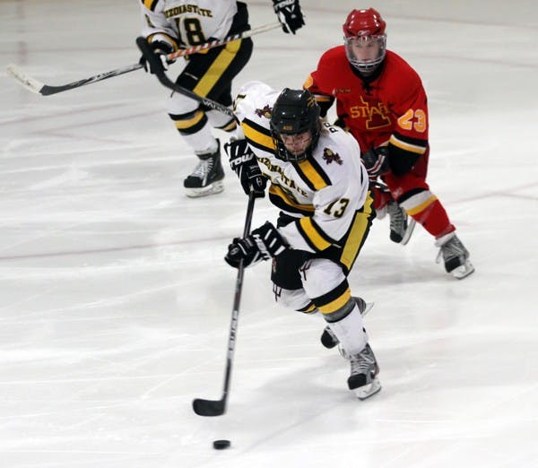 ASU defenseman Brett Prechel handles the puck during the Sun Devils’ meeting against Iowa State earlier this season. The No. 4 Sun Devil club hockey team faces No. 6 Ohio over the weekend in a crucial two-game series that could affect playoff seeding. (Photo by Lisa Bartoli)