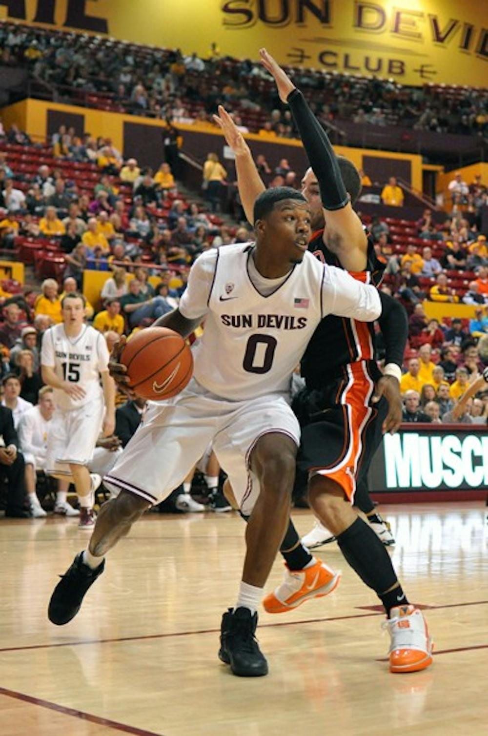 Carrick Felix drives to the hoop against Oregon State on Jan. 14. The Sun Devils were unable to snap Colorado’s home winning streak Thursday night, losing 69–54. (Photo by Aaron Lavinsky)