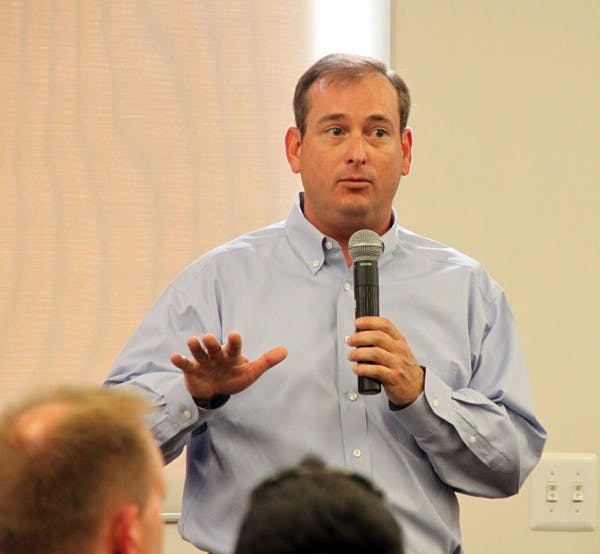 SUPERCOMPUTER TALK: Steve Beckis from Intel Corporation talks to a group of students at the A2C2 and IBM High Performance Computing Event Wednesday afternoon in the Memorial Union. (Photo by Rosie Gochnour)