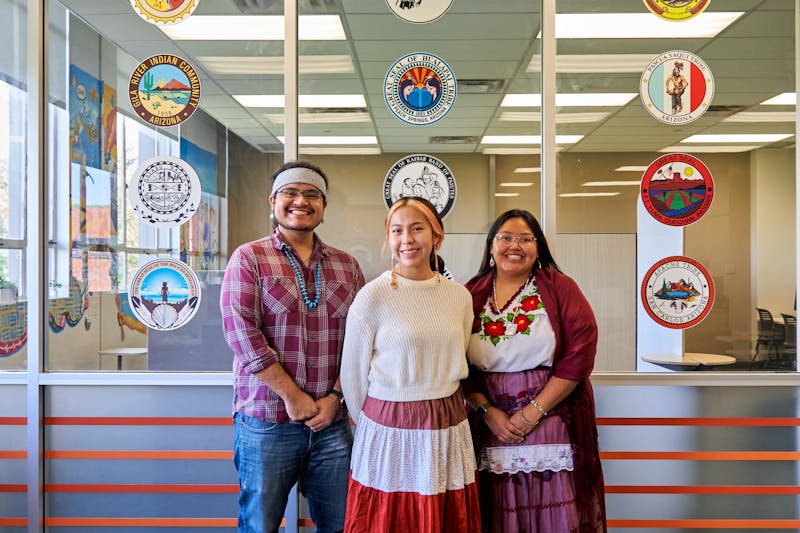 Brain Forkum (left), Miyana Manus (center) and Catalina Alvarez (right) pose for a photo in the American Indian Student Support Services room in Discovery Hall on ASU's Tempe campus on Tuesday, Nov. 9, 2021.