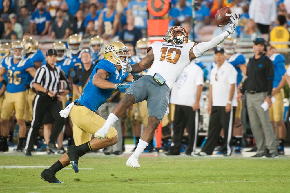 Senior defensive back Kweishi Brown attempts to intercept a pass against UCLA on Saturday, Oct. 3, 2015, at Rose Bowl Stadium in Pasadena, Calif. The Sun Devils defeated the Bruins 38-23.
