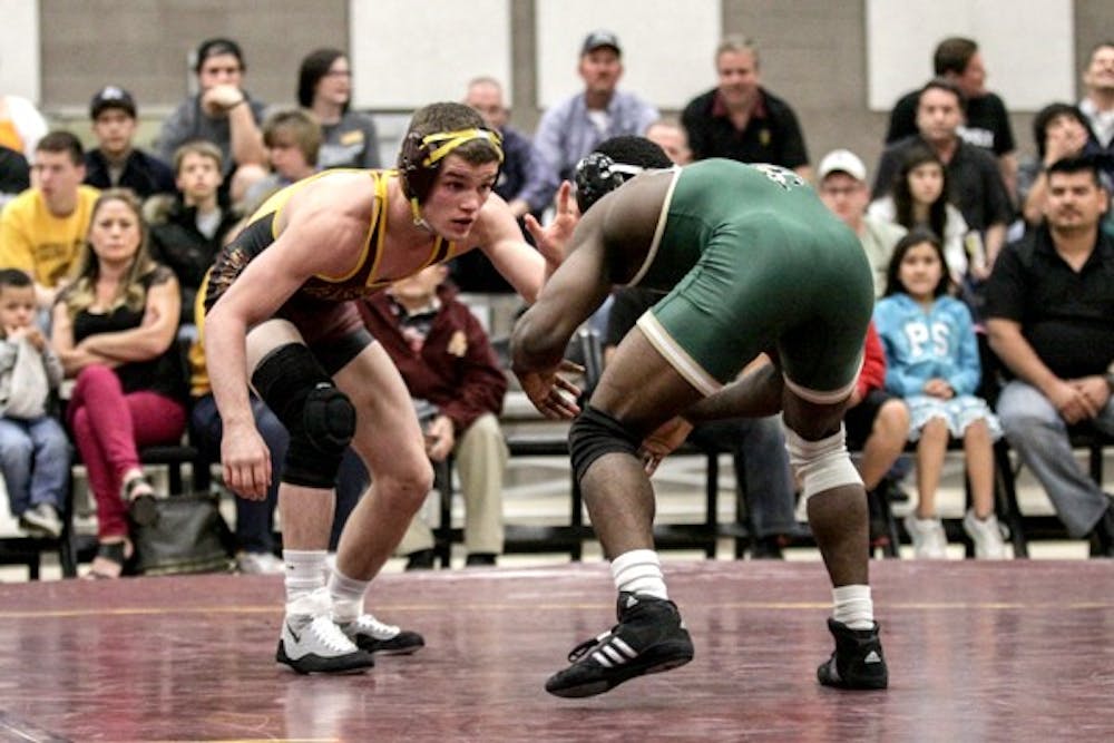 Redshirt sophomore Dalton Miller faces off against Cal Poly sophomore Brittain Longmire during the Sun Devils' win over the Broncos as the ASU Polytechnic Campus on Feb. 15. (Photos courtesy of Arianna Grainey)
