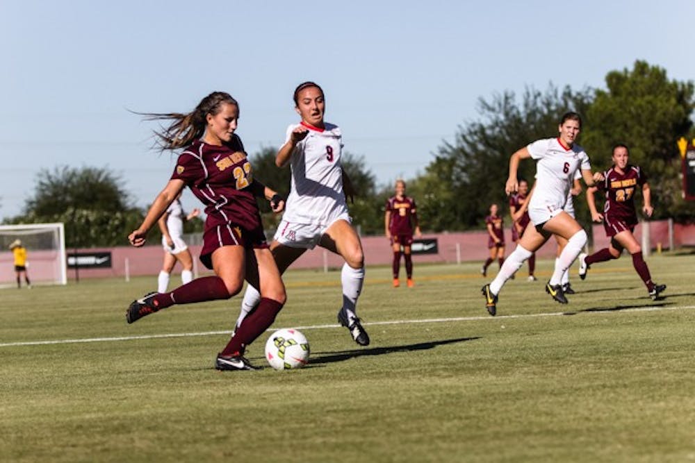 Freshman defender Madison Stark slots home the winning goal inside the 18 yard box during the ASU vs Arizona soccer game on Friday, Nov. 7, 2014. Her strike helped seal a 1-0 Sun Devil victory. (Photo by Daniel Kwon)