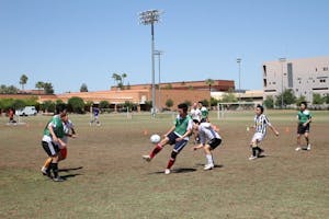 ASU OLYMPICS: Students from different parts of the world play soccer at the SRC field on Saturday afternoon as part of the olympic event hosted by the Coalition of International students over the weekend. (Photo by Nikolai de Vera)