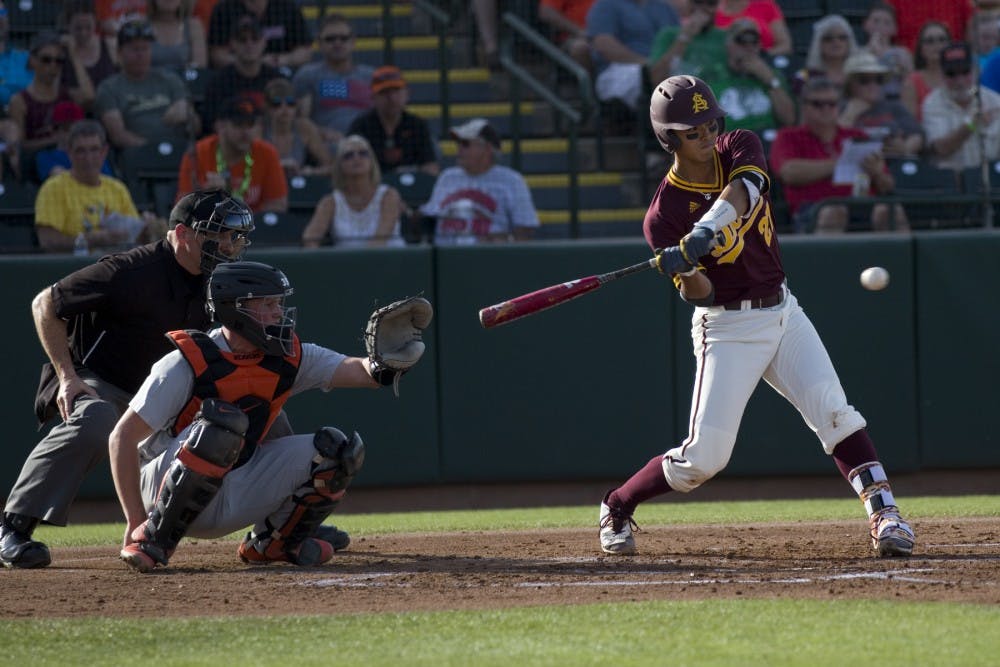 ASU freshman infielder Lyle Lin (27) swings the bat during game two of a baseball series against the Oregon State Beavers at Phoenix Municipal Stadium in Phoenix on Friday, March 17, 2017. ASU lost 10-1. 