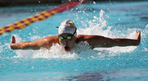 Caroline Kuczynski swims the butterfly in a meet against UA on Feb. 11. Kuczynski and the Sun Devilsare set to compete in the Pac-12 Championships in Washington. (Photo by Lisa Bartoli)
