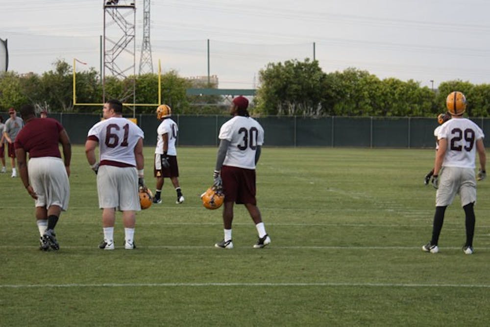 EARNING A SPOT: Sophomore safety Keelan Johnson (third from right in distance) has improved greatly since his freshman year and is aiming to star in a starting role after the graduation of Ryan McFoy and Jarrell Holman. (Photo by Kyle Thompson)