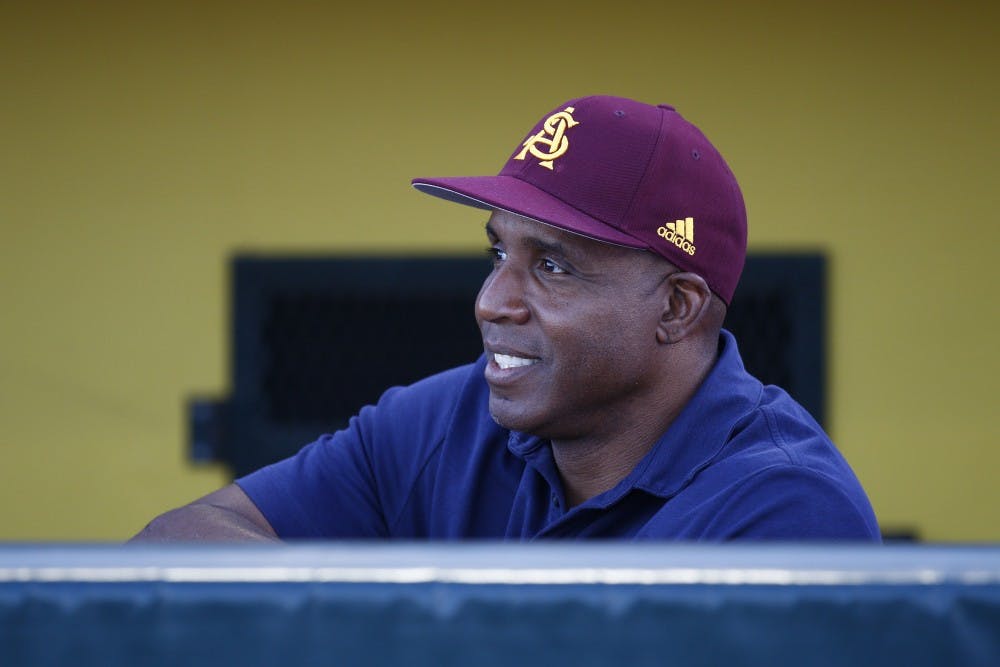 Former ASU baseball slugger Barry Bonds smiles in the dugout before an on-field ceremony at Phoenix Municipal Stadium in Phoenix, Arizona&nbsp;on March 28, 2017.