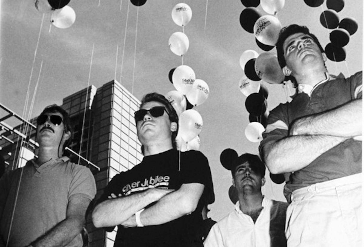 BROS & BALLOONS: Students gather in front of the Architecture building for its dedication ceremony in Oct. 1989. (Photo by Jack Beasley)
