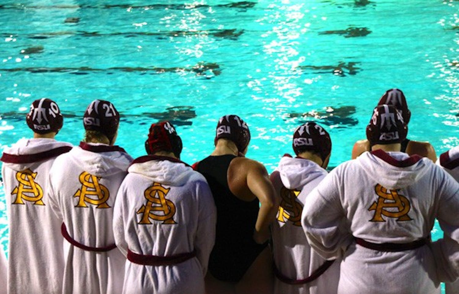 NORTHERN DOMINANCE: Members of the ASU water polo team look on during their 12-5 scrimmage loss against the Canadian National Team. The Sun Devils played well, but were no match for Team Canada, dropping all three games.(Photo by Rosie Gochnour)