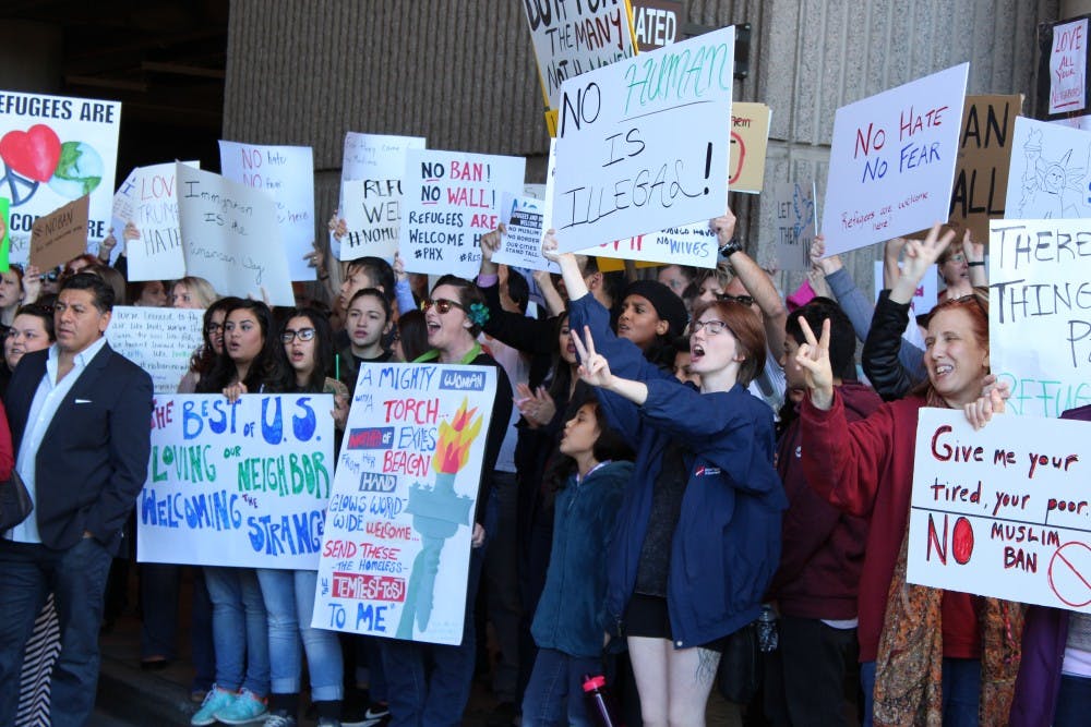 Protestors gather&nbsp;at Phoenix Sky Harbor International Airport on Sunday, Jan. 29, 2017 in response to President Trump's executive order banning travel from several Muslim-majority countries.