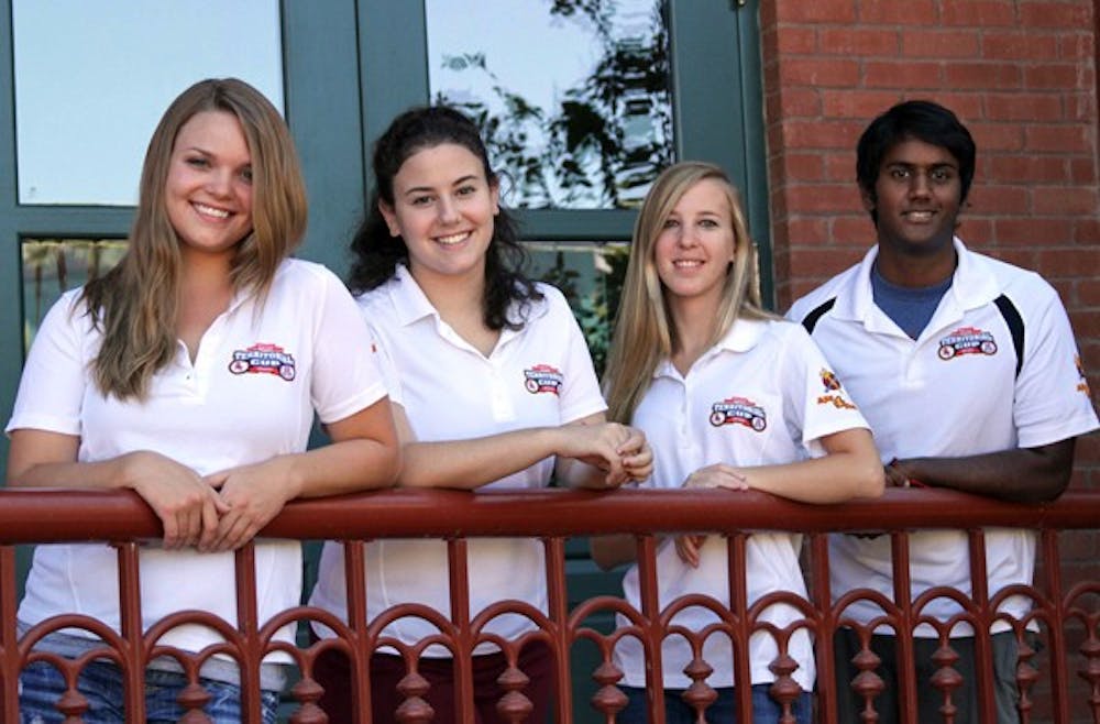 CRUSHING HUNGER: Theresa Reckamp, Elana Niren, Megan Barlow and Sidath Wijetunga are the officers for ASU4Food, an organization whose biggest event is held over homecoming, when they donate money and cans to the less fortunate. (Photo by Lisa Bartoli)