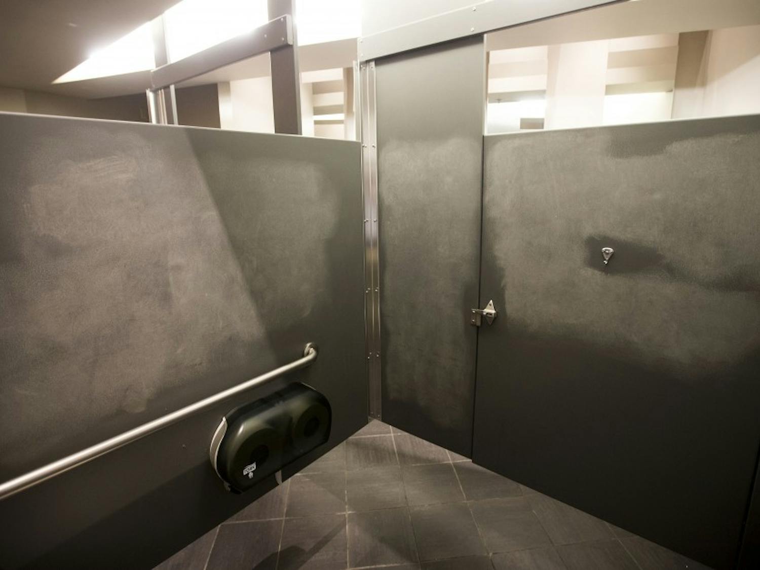 A freshly-cleaned bathroom stall in the Palo Verde East building is seen on Friday, Nov. 11, after a graphic message was allegedly written on the walls.