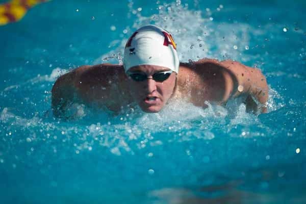 ASU then-senior Nolan Ruane pushes through the water during a race against Cal in 2011. Ruane stuck around even when the men’s swimming team was almost cut from ASU athletics.