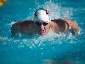 ASU then-senior Nolan Ruane pushes through the water during a race against Cal in 2011. Ruane stuck around even when the men’s swimming team was almost cut from ASU athletics.