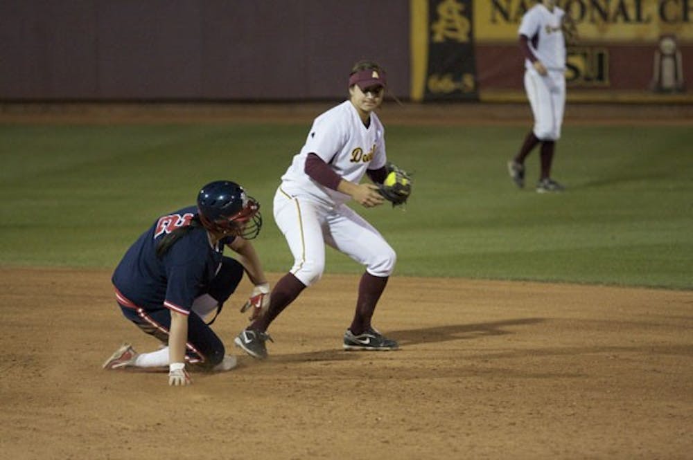 RACE TO THE BASE: Freshman second baseman Sam Parlich gets a force out in the Sun Devils’ 12-6 loss to UA on Thursday at home. ASU beat UA 11-1 on Saturday, but lost Sunday, 14-2. (Photo by Scott Stuk)