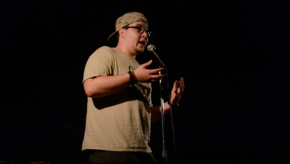 Journalism freshman Jack Wilson spins a yarn at Lawn Gnome Publishing. The event happens every week in downtown Phoenix and the art of Yarnball Storytelling can consist of rehearsed or improvised storytelling. (Photo by Adiranna Ovnicek)