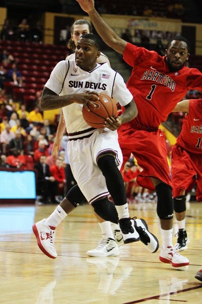 Redshirt freshman Jahii Carson (1) drives through the paint during the Sun Devils’ 71-63 win over the Hawks Wednesday. (Photo by Sam Rosenbaum)