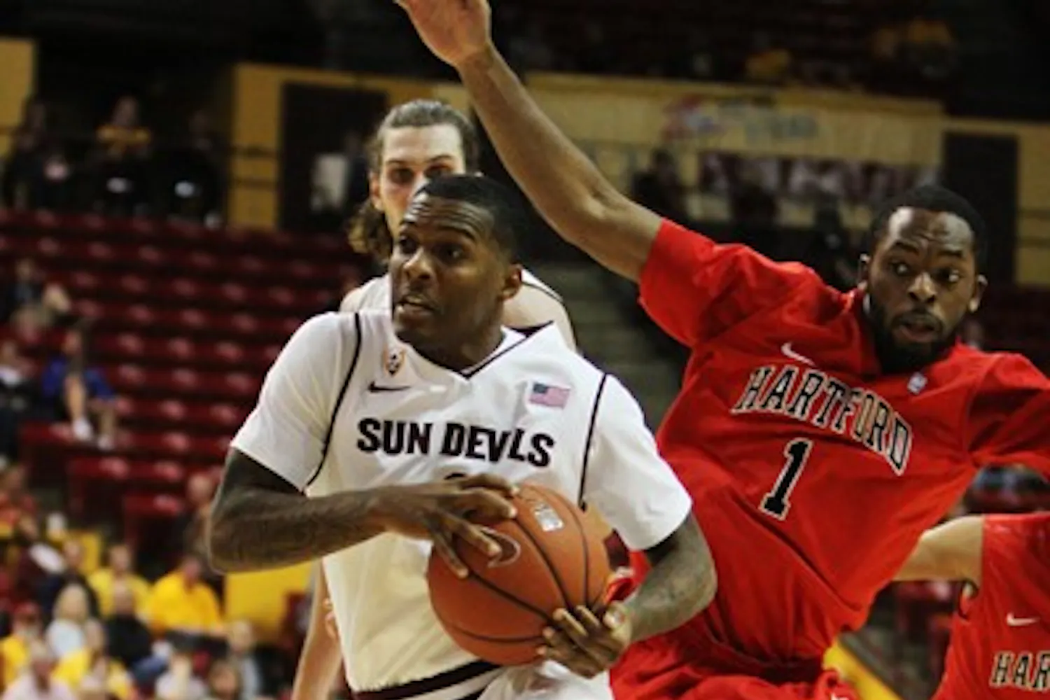 Redshirt freshman Jahii Carson (1) drives through the paint during the Sun Devils’ 71-63 win over the Hawks Wednesday. (Photo by Sam Rosenbaum)