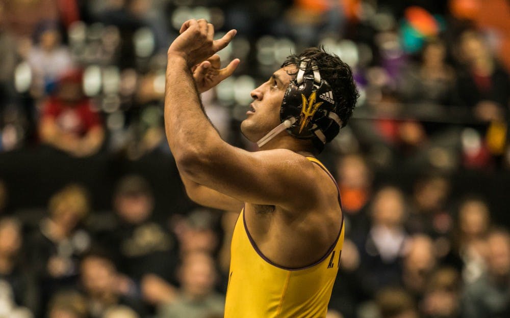 ASU now-redshirt senior Anthony Valencia celebrates after winning his championship match of the Pac-12 Championship Conference at the Gill Coliseum in Corvallis, Oregon, on Sunday, Feb. 25, 2018.