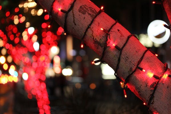 Holiday lights twinkle on Mill Avenue, giving the street a festive vibe on Thursday night. (Photo by Jenn Allen)