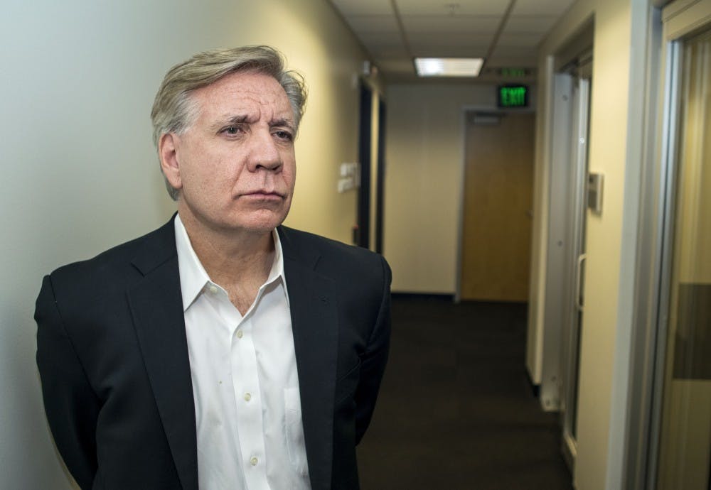 Christopher Callahan, dean of the Walter Cronkite School of Journalism and Mass Communication, speaks to members of the Blaze radio station before an interview on Wednesday, Nov. 16, 2016.