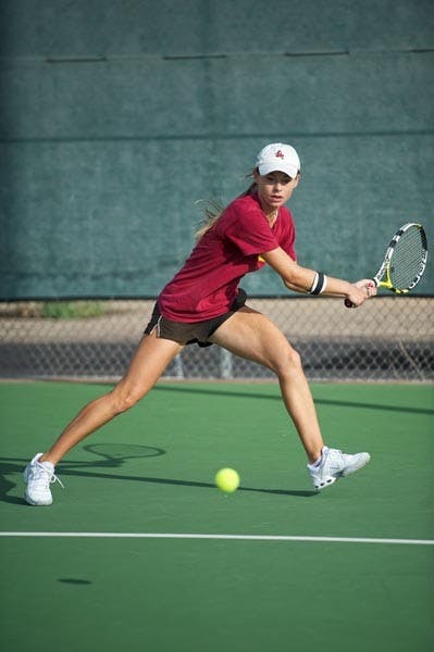 HOME COURT: ASU senior Micaela Hein prepares for a backhand while playing at the ASU Whiteman Tennis Center in Tempe. The Sun Devils compete at home for the first time this season by hosting the ASU Thunderbird tournament, which starts Friday. (Photo by Michael Arellano)