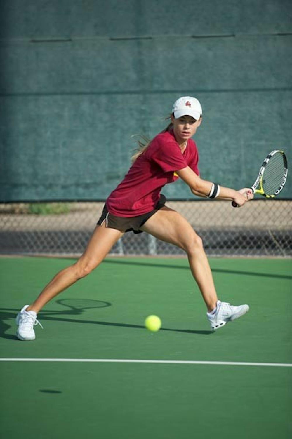 HOME COURT: ASU senior Micaela Hein prepares for a backhand while playing at the ASU Whiteman Tennis Center in Tempe. The Sun Devils compete at home for the first time this season by hosting the ASU Thunderbird tournament, which starts Friday. (Photo by Michael Arellano)