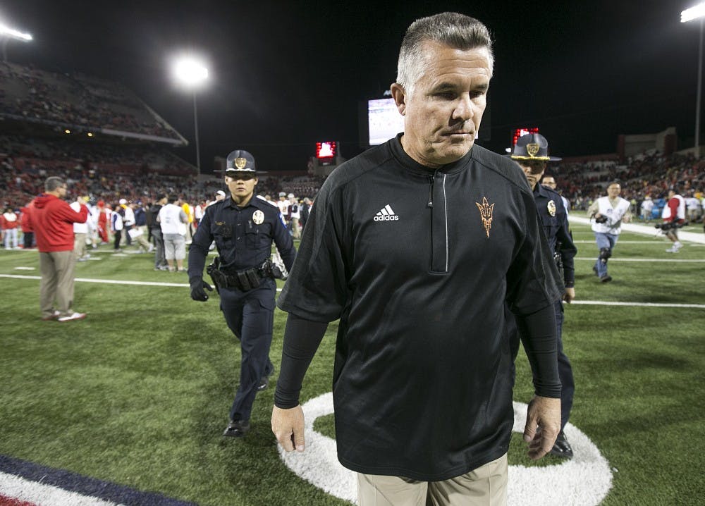 ASU Sun Devils head coach Todd Graham walks off the field after the annual Territorial Cup football game against UA in Tucson's Arizona Stadium on Friday, Nov. 25, 2016.