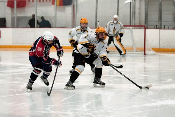 ASU defenseman Drew Newmeyer looks for an open teammate during the game against UA on Oct. 11. ASU closed out UA 3-0 on Oct 11.
