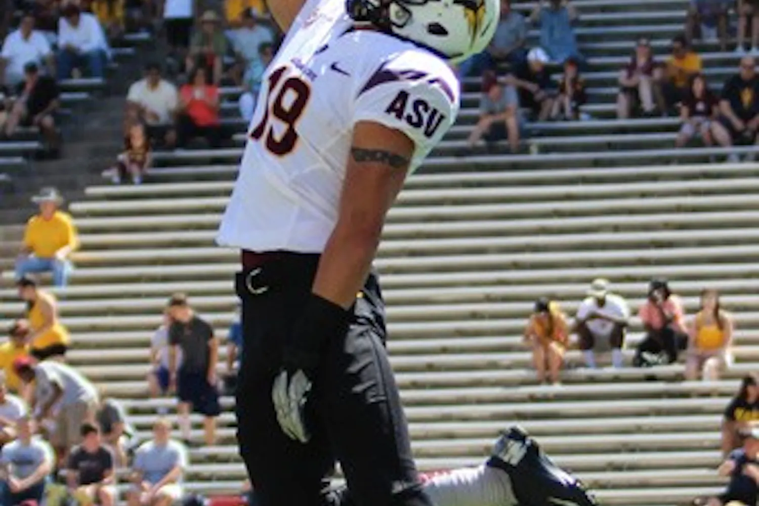 Senior defensive back Jordan Simone leaps for a catch in warmups during the Sun Devils' Fan Fest on April 13. ASU coach Todd Graham was impressed with the defense during the spring game. (Photo by Dominic Valente.)