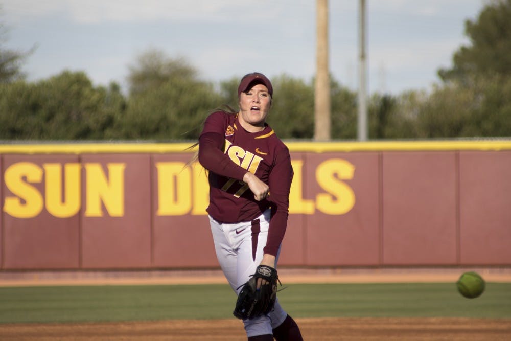 Freshman Dale Ryndak throws a pitch against University of Michigan at Farrington Stadium on Friday Feb. 27, 2015. (Jacob Stanek/State Press)