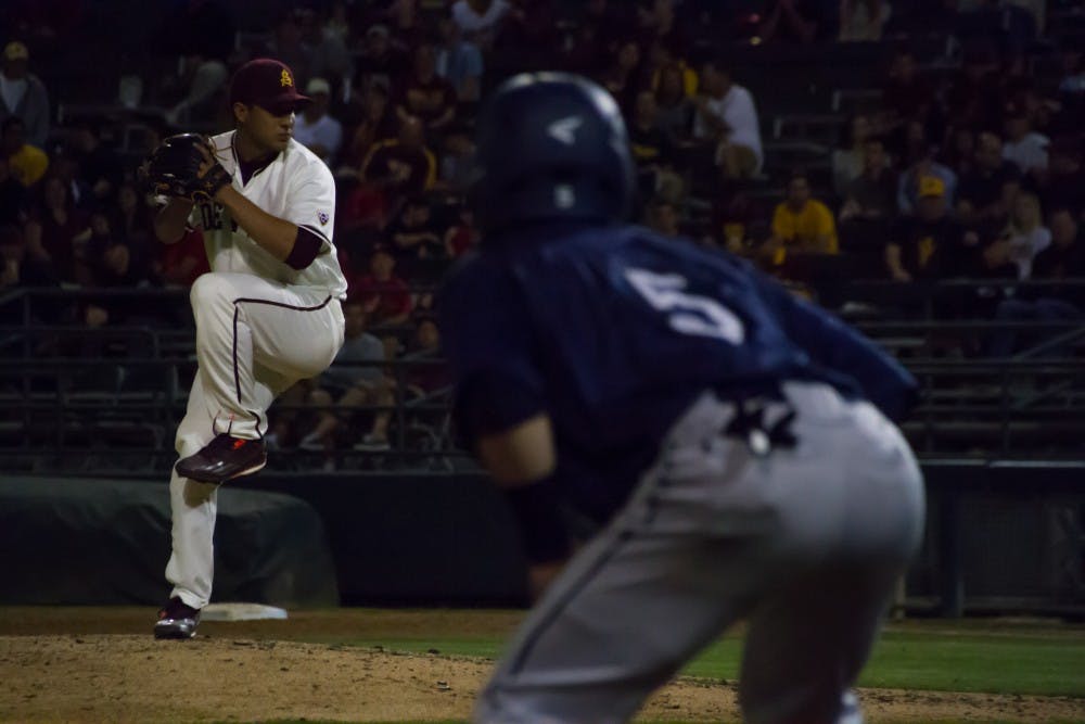 Junior pitcher&nbsp;Hever Bueno throws a pitch against Xavier on Friday, Feb. 19 at Phoenix Municipal Stadium. ASU baseball won 5-2.