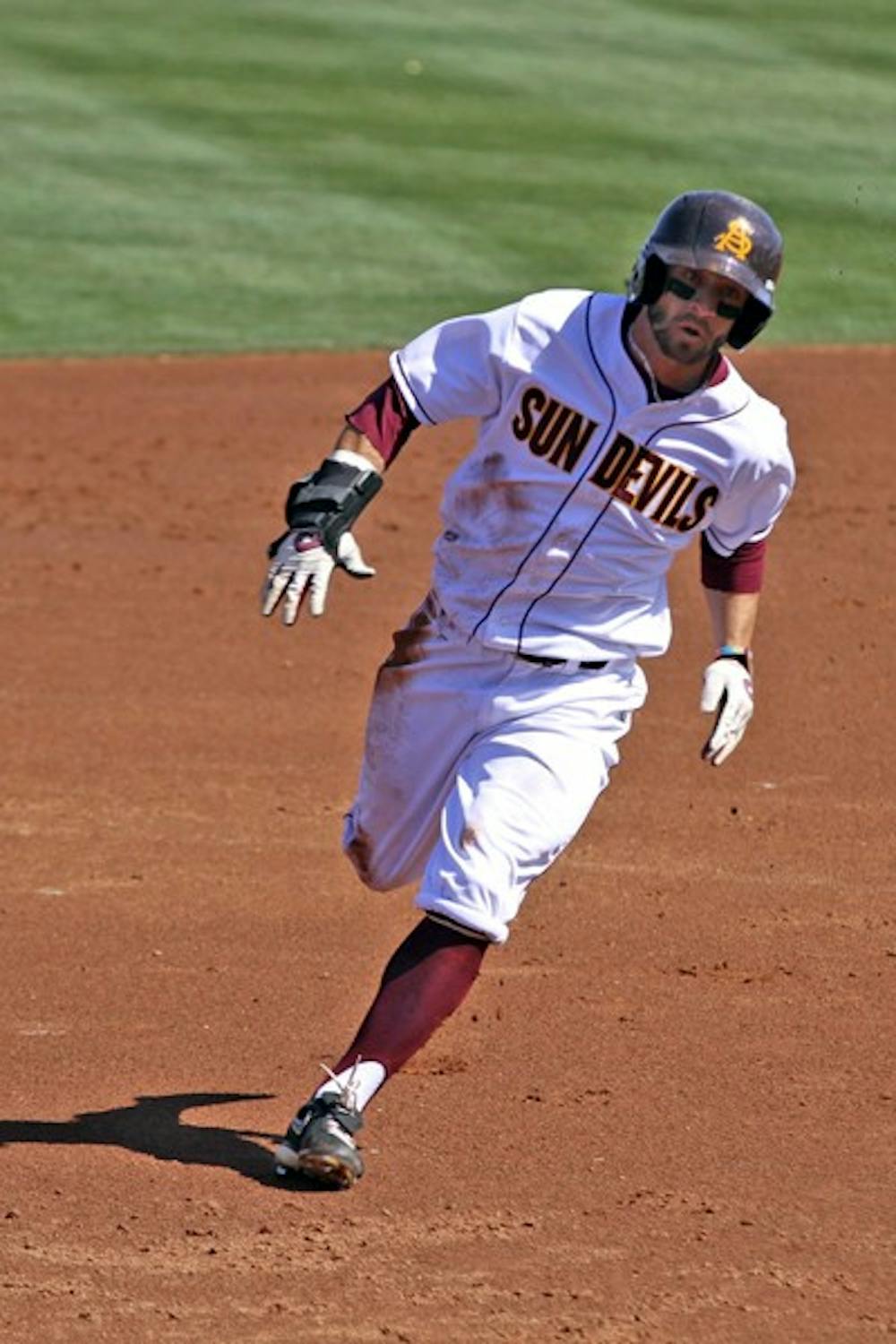 GOOD EYE: Senior outfielder Kole Calhoun takes a pitch during a game last month at Packard Stadium. ASU opens up a weekend series against Auburn on Friday. (Photo by Scott Stuk)