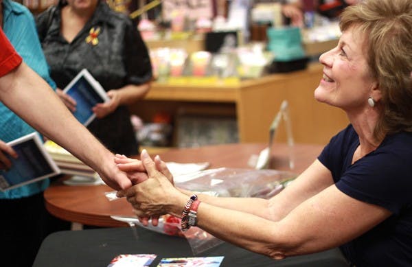 MEMOIRS OF 9/11: On the 10th anniversary of her husband's death, Donna Killoughey-Bird signs copies of her new book at Changing Hands Bookstore in Tempe on Sunday afternoon. (Photo by Lillian Reid)