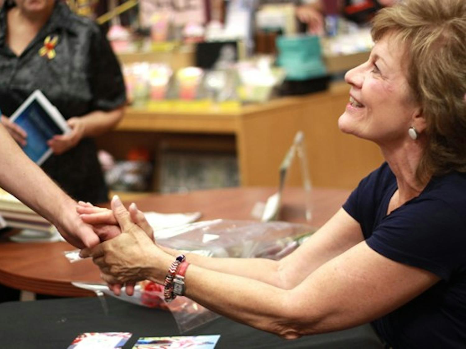 MEMOIRS OF 9/11: On the 10th anniversary of her husband's death, Donna Killoughey-Bird signs copies of her new book at Changing Hands Bookstore in Tempe on Sunday afternoon. (Photo by Lillian Reid)