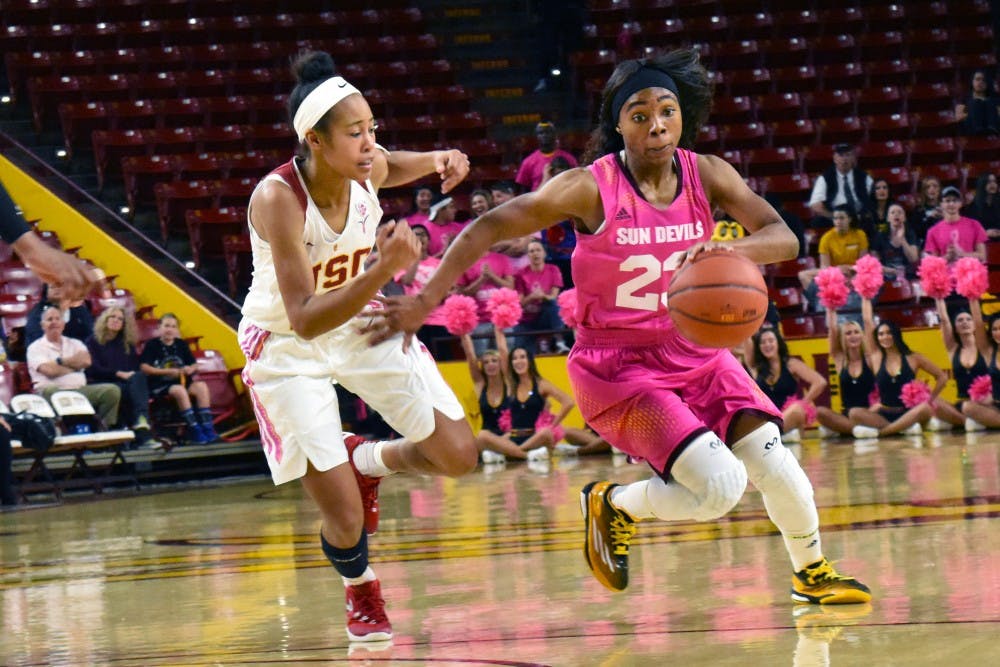 Arizona State University senior gaurd Elisha Davis dribbles towards the basket in a game against the University of Southern California held on Sunday, Feb. 7, 2016, at the Wells Fargo Arena in Tempe.  