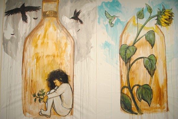  Tom Greyeyes' 40oz Bottle, acrylic on canvas, hangs in the Night Gallery as part of the Map(ing) 2013 exhibit on Thursday, January 10. (Photo by Yvonne Gonzalez)