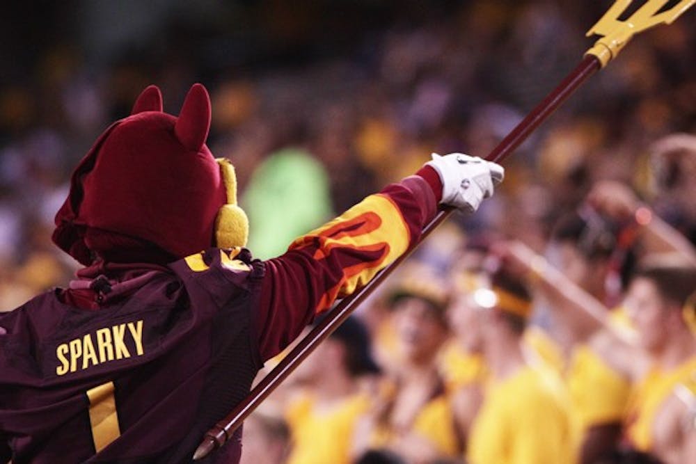 SPARKY'S FORK: Sparky brandishes his new pitchfork to the student section when ASU faced UC Davis on Sept. 1, 2011. (Photo by Beth Easterbrook)