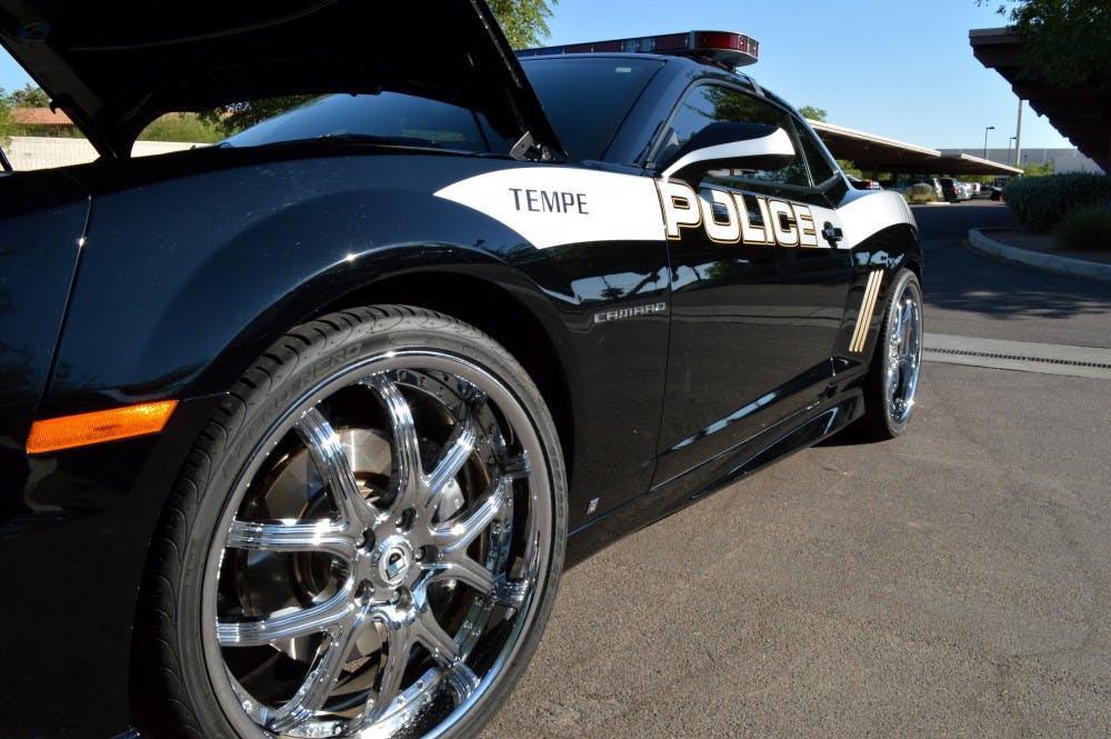 The 2010 Chevy Camaro was seized from a valley methamphetamine ring that forked out $3,000 per rim and a sound system that Tempe police detective Dan Brown said is worth approximately $10,000. (Photo by Corey Malecka)