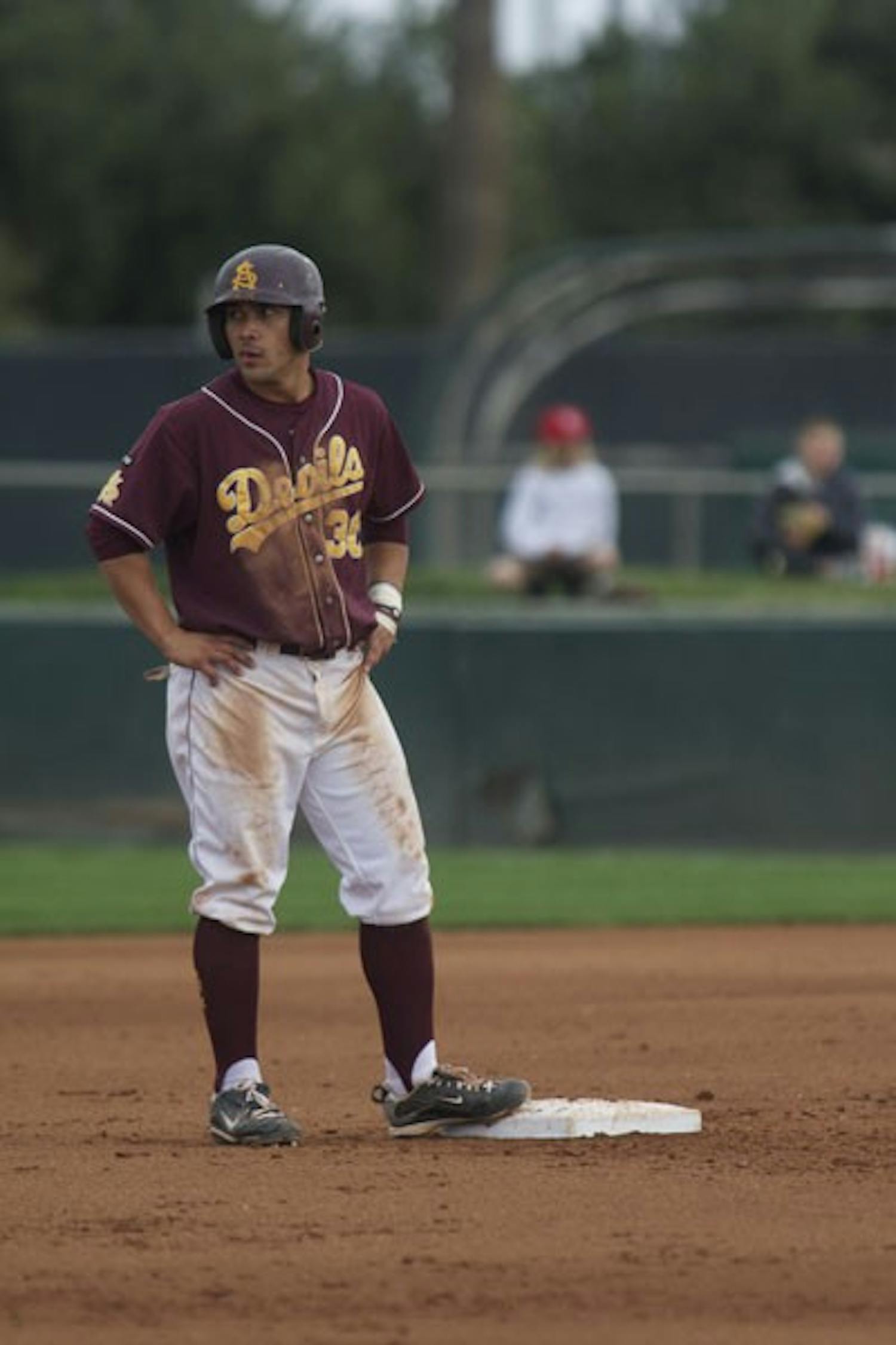 Schedule Strength: ASU junior infielder Riccio Torrez stands on second base during the Sun Devils’ game against Delaware on Feb. 26. ASU sits atop the Pac-10 rankings after winning two out of three games against UA this past weekend. (Photo by Scott Stuk)
