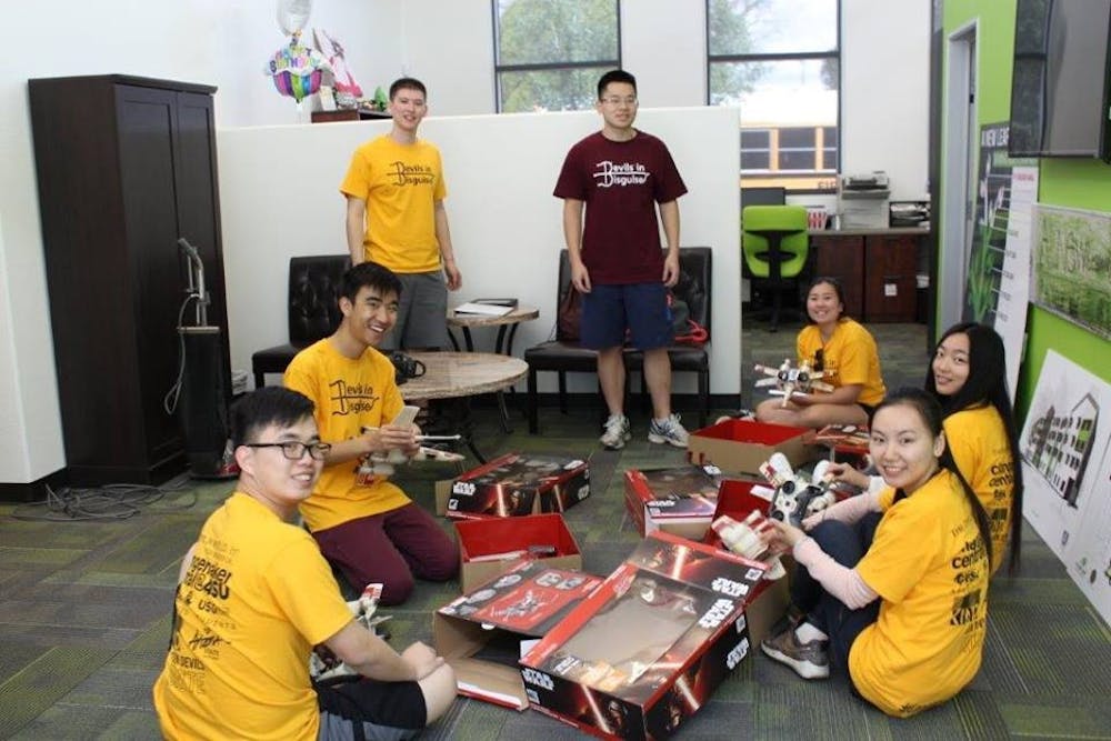 Students volunteer for ASU Changemaker Central at an event.