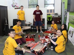 Students volunteer for ASU Changemaker Central at an event.