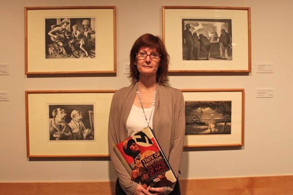 NAZI PROPOGANDA: Heather Sealy Lineberry traveled to Washington D.C. to help design an exhibit of propaganda from World War II. (Photo by Rosie Gochnour)