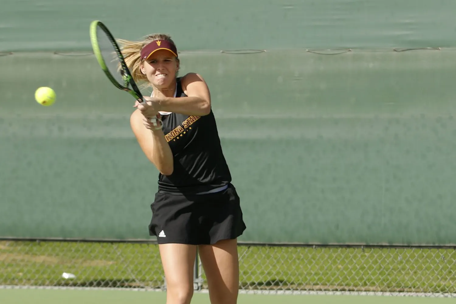 ASU sophomore Sammi Hampton competes in a singles match against Nevada at the Whitemans Tennis Center in Tempe, Arizone on Friday Feb. 17, 2017.