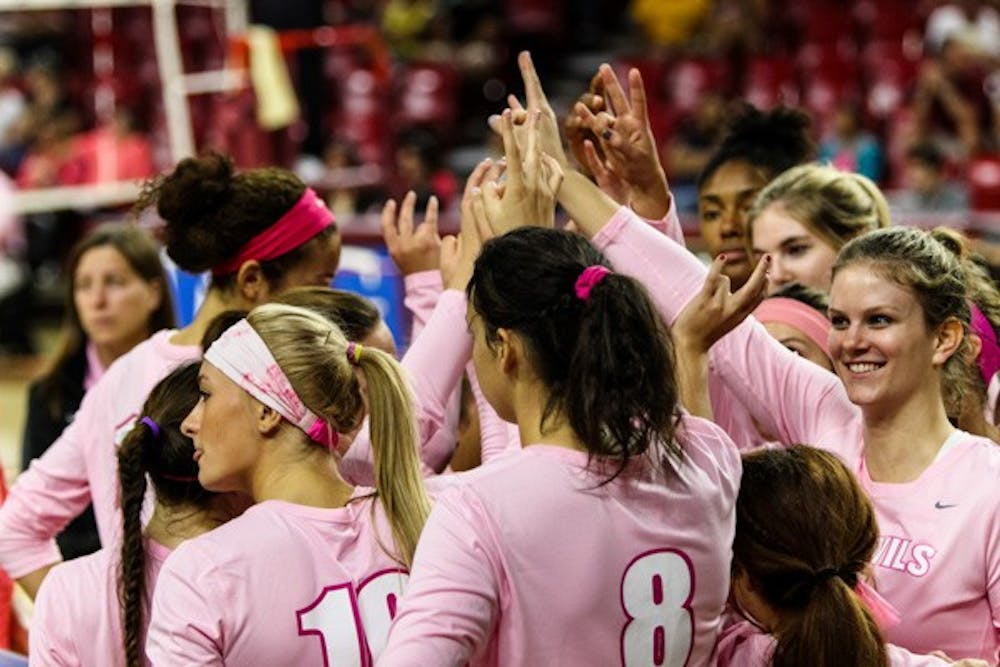 The Sun Devil volleyball team groups up before the beginning of the match vs Washington State on Sunday, Oct. 19th, 2014, at Wells Fargo Arena in Tempe. The Sun Devils would rally from two sets down to beat the Cougars 3-2. (Photo by Daniel Kwon)