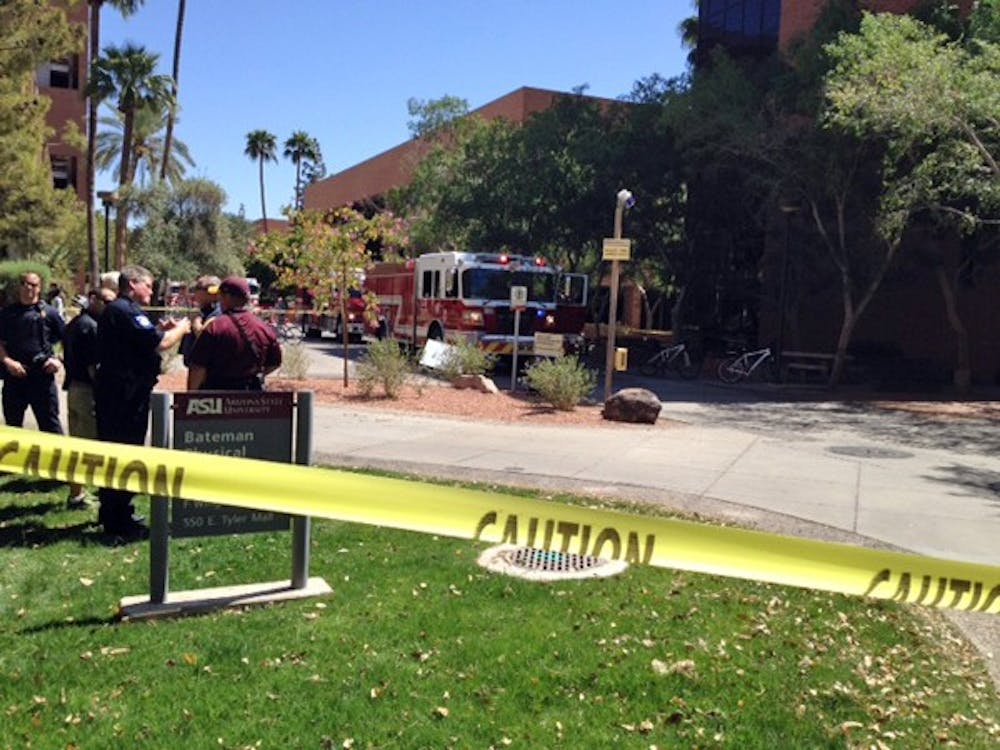 A small fire that started from an overheated laptop evacuated the Engineering Research Center on the Tempe campus Tuesday morning. No one was hurt. (Photo by Shawn Raymundo)