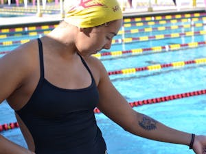 ASU senior swimmer Katarina Simonovic shows off her new ink at the Mona Plummer Aquatic Complex on Aug. 27, 2016.